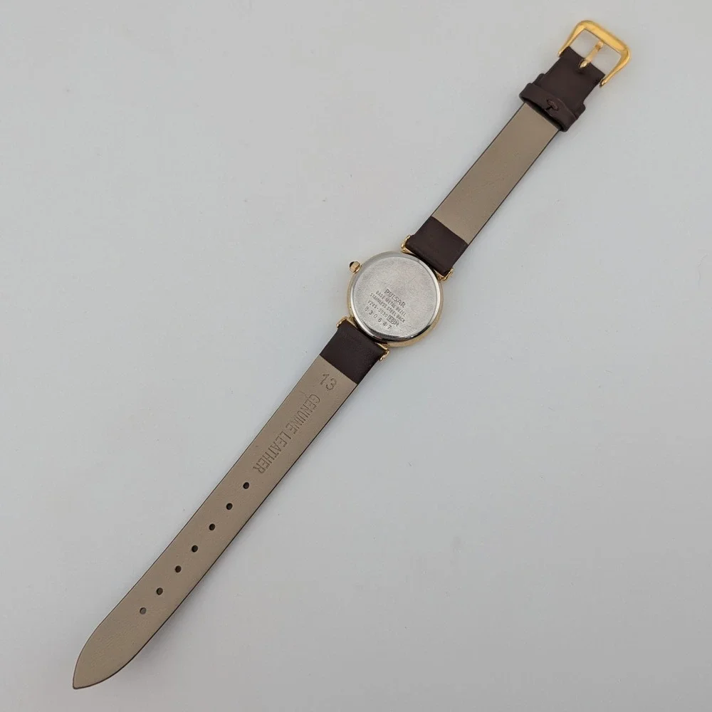 Pulsar V249-0030 Date Pointer Gold Tone White Dial Brown Leather Women's Watch
